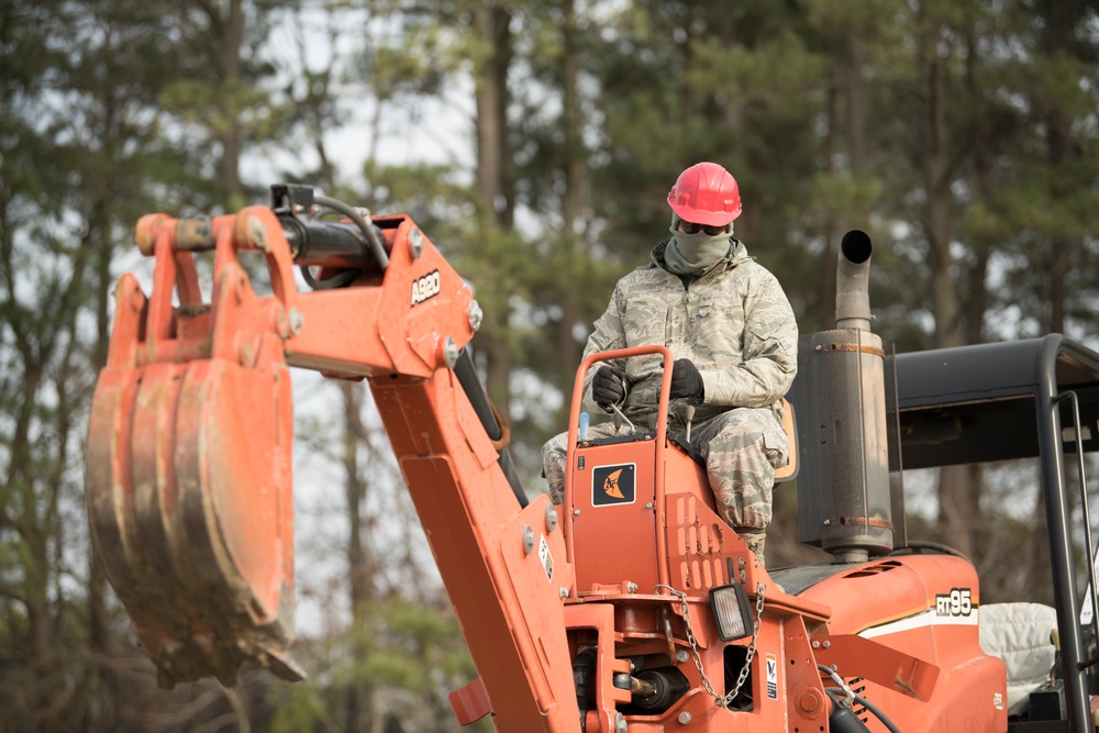 203rd RHS train on heavy equipment
