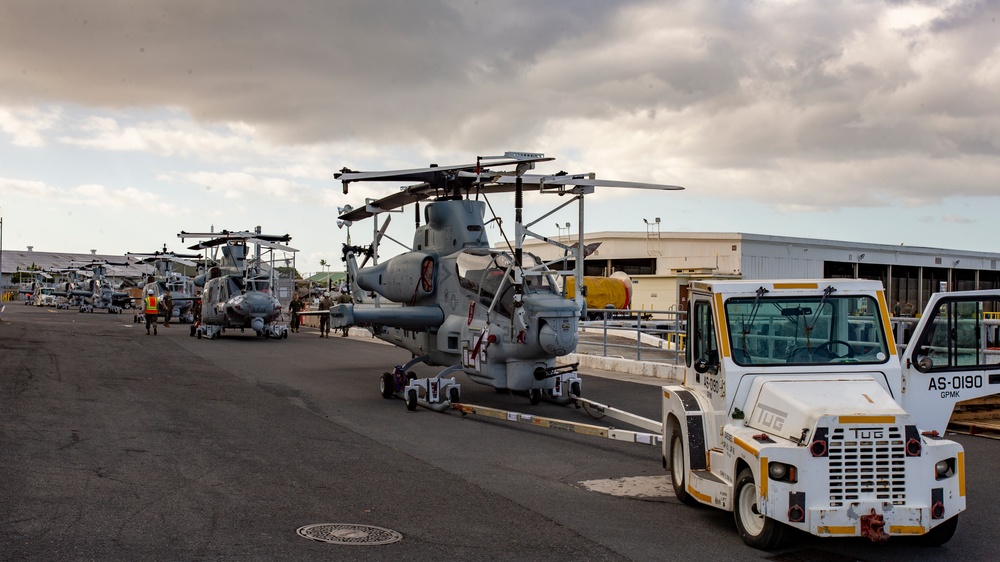 Marine Aircraft Group 24 loads aircraft onto ship