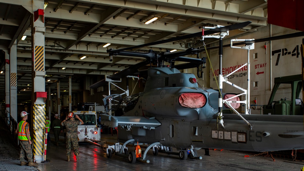 Marine Aircraft Group 24 loads aircraft onto ship