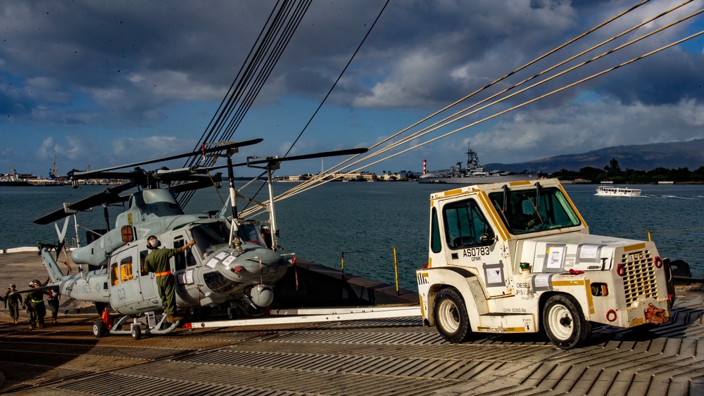 Marine Aircraft Group 24 loads aircraft onto ship