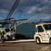 Marine Aircraft Group 24 loads aircraft onto ship