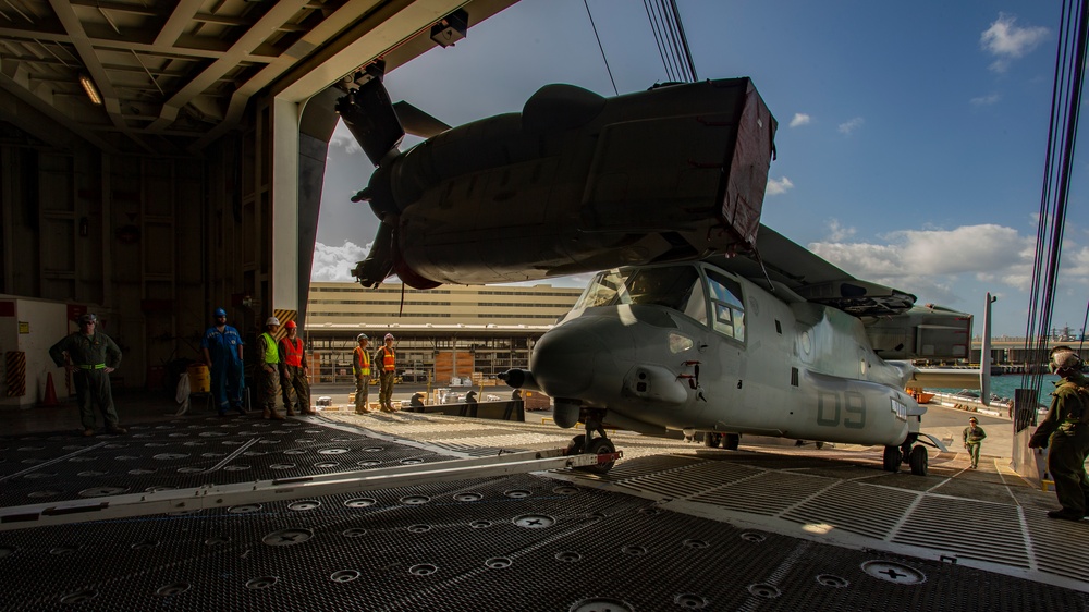 Marine Aircraft Group 24 loads aircraft onto ship