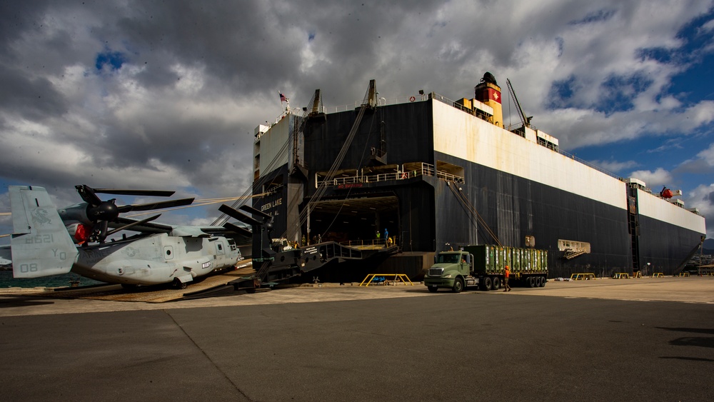 Marine Aircraft Group 24 loads aircraft onto ship