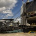 Marine Aircraft Group 24 loads aircraft onto ship