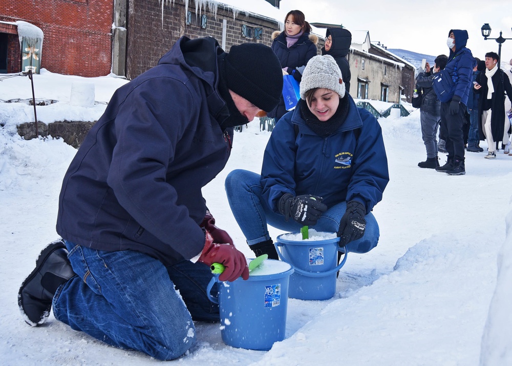Blue Ridge Sailors make snow lanterns in Otaru, Japan