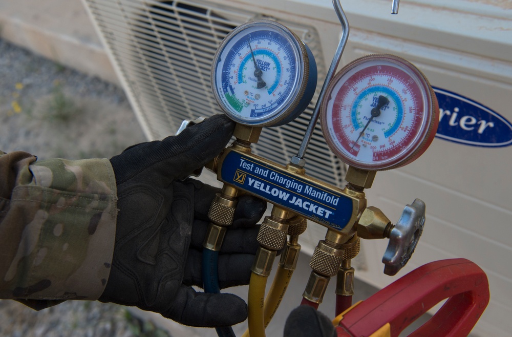 Expeditionary HVAC technicians battle the heat; distribute the cool