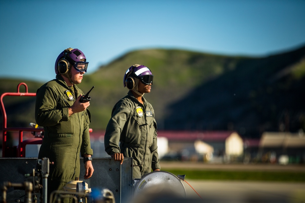 Pit crew. Bulk fuel specialists conduct refueling operations on MCAS Camp Pendleton.