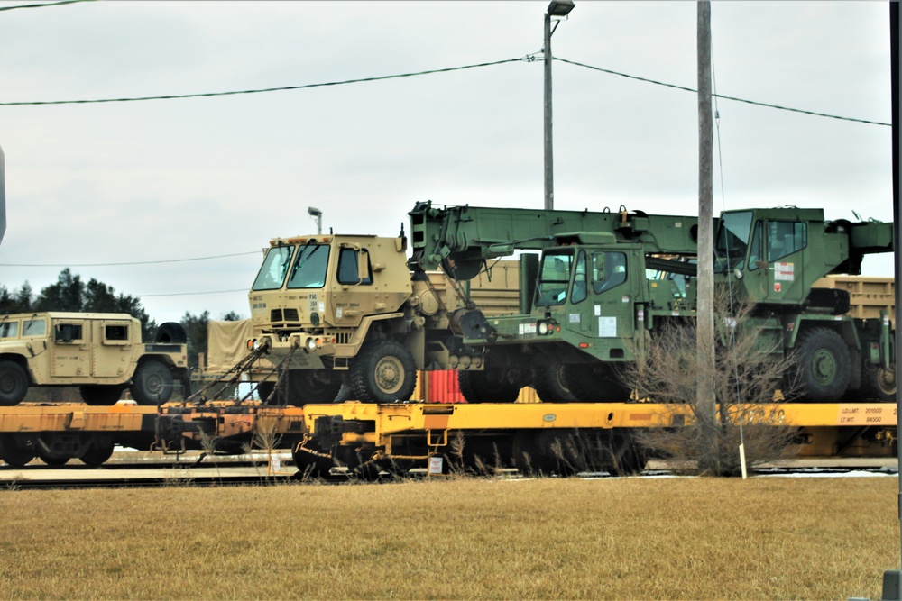 Engineer unit loads railcars for deployment at Fort McCoy