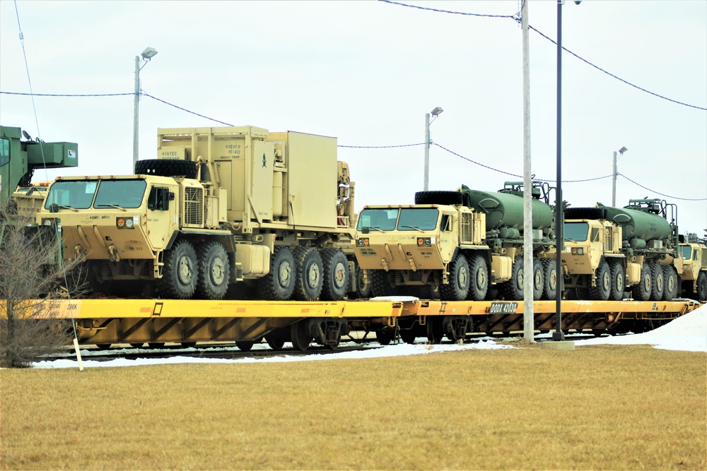 Engineer unit loads railcars for deployment at Fort McCoy