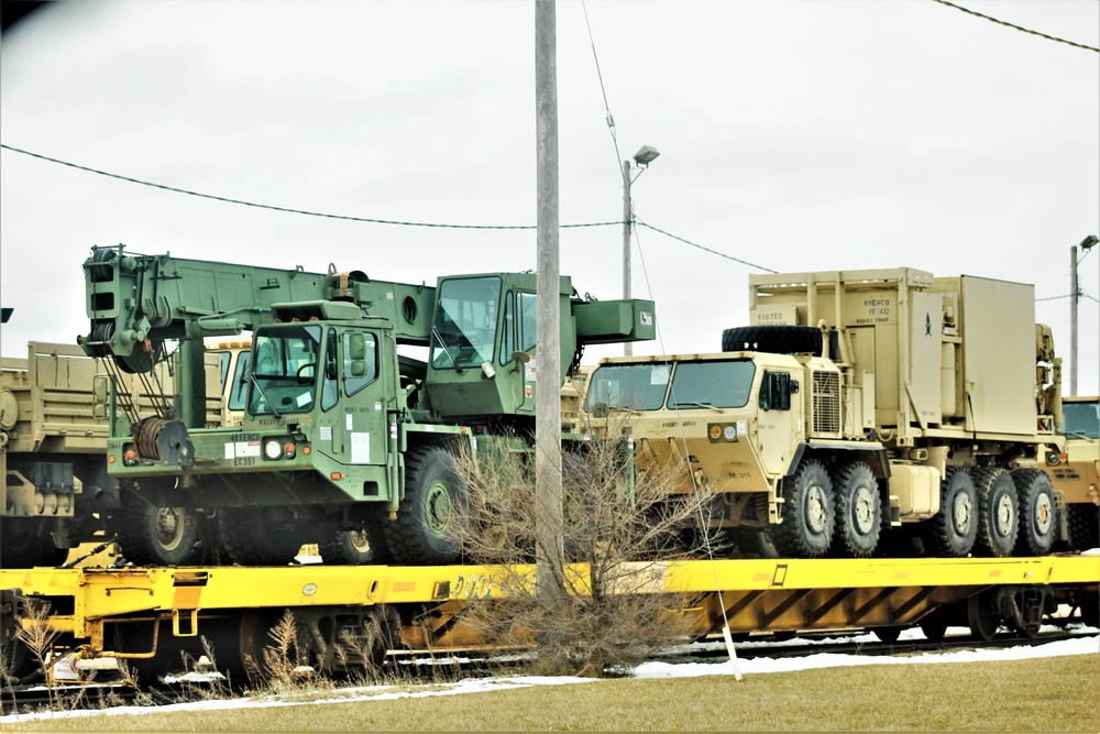 Engineer unit loads railcars for deployment at Fort McCoy