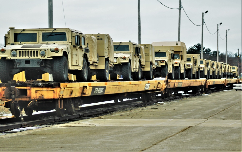 Engineer unit loads railcars for deployment at Fort McCoy