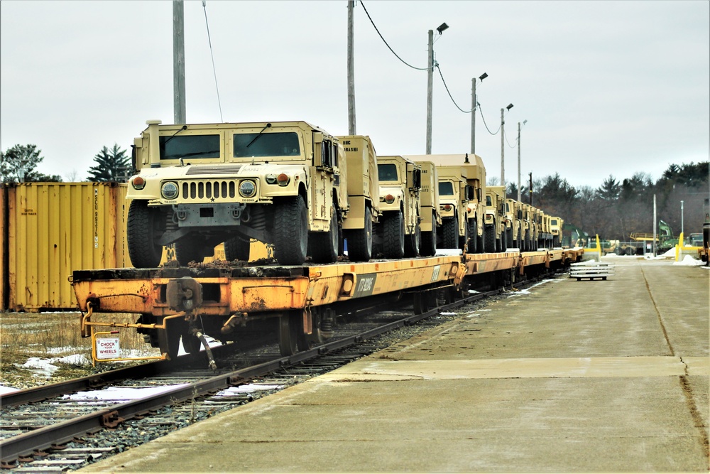 Engineer unit loads railcars for deployment at Fort McCoy