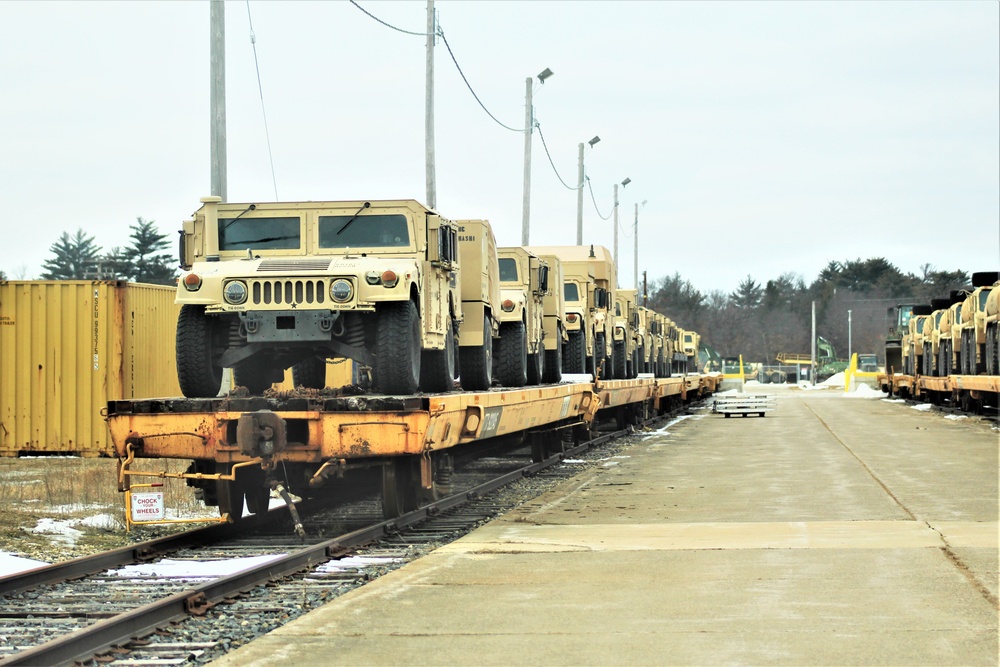 Engineer unit loads railcars for deployment at Fort McCoy