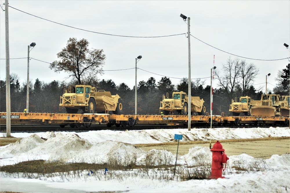 Engineer unit loads railcars for deployment at Fort McCoy