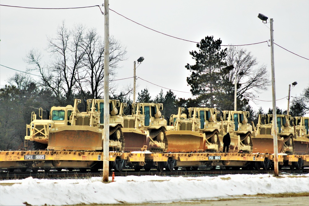 Engineer unit loads railcars for deployment at Fort McCoy