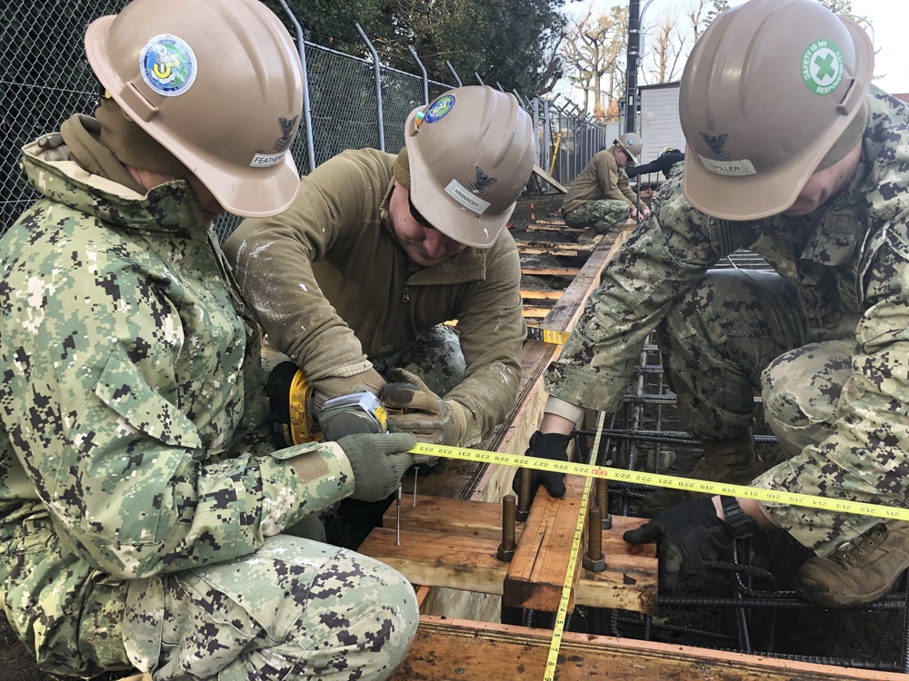 Seabees Pour Concrete For Pre-Engineered Building