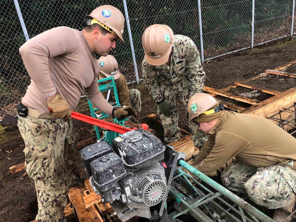 Seabees Pour Concrete For Pre-Engineered Building