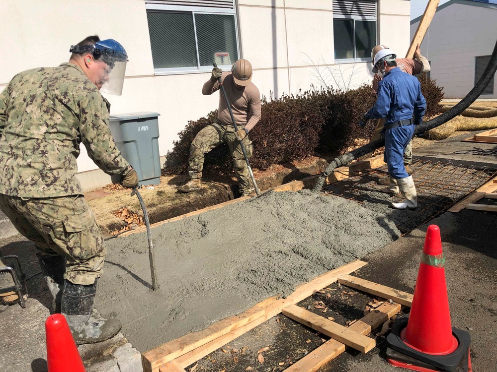 Seabees Pour Concrete For Pre-Engineered Building