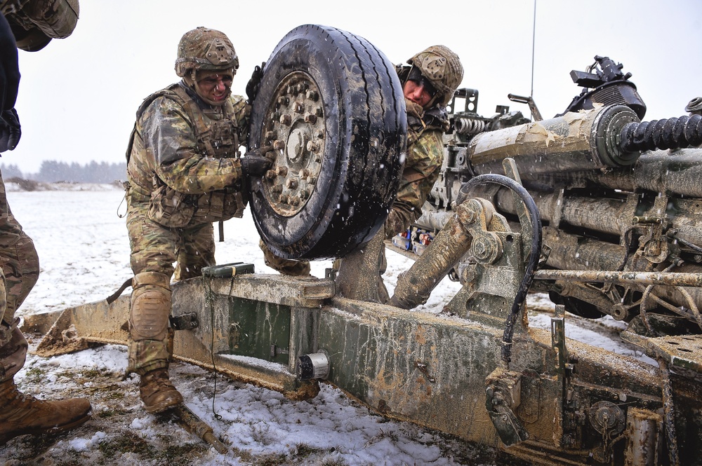 Paratroopers ready their howitzer