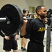 Paratrooper prepares to squat