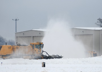 104th Civil Engineering Squadron clears snow after winter storm
