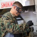 Bulk fuel specialists conduct routine fuel check.