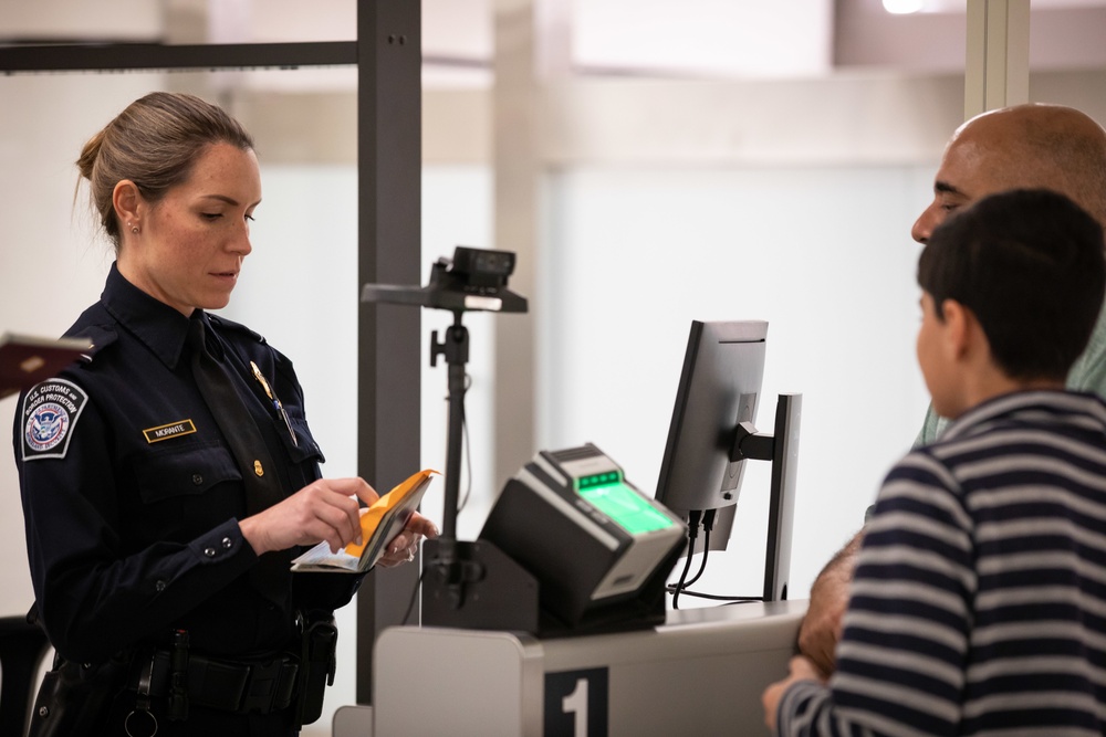 CBP Officers inspect travelers
