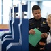 CBP Officers inspect travelers in Miami