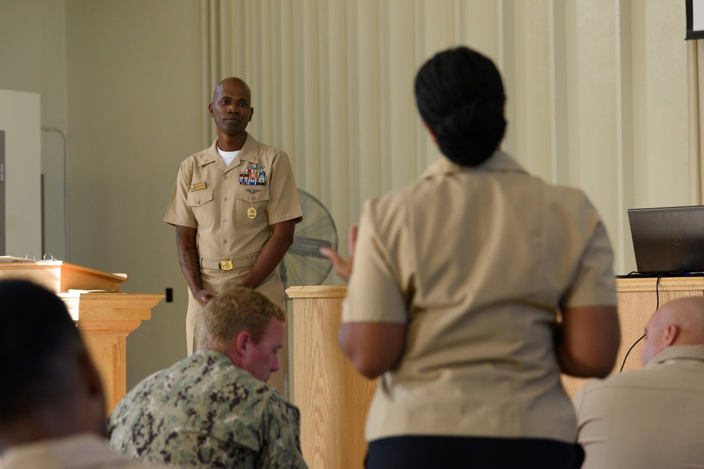 U.S. Naval Base Guam Command Master Chief Ken Ballard speaks at the Guam Yeoman-Legalman-Personnel Specialist Symposium