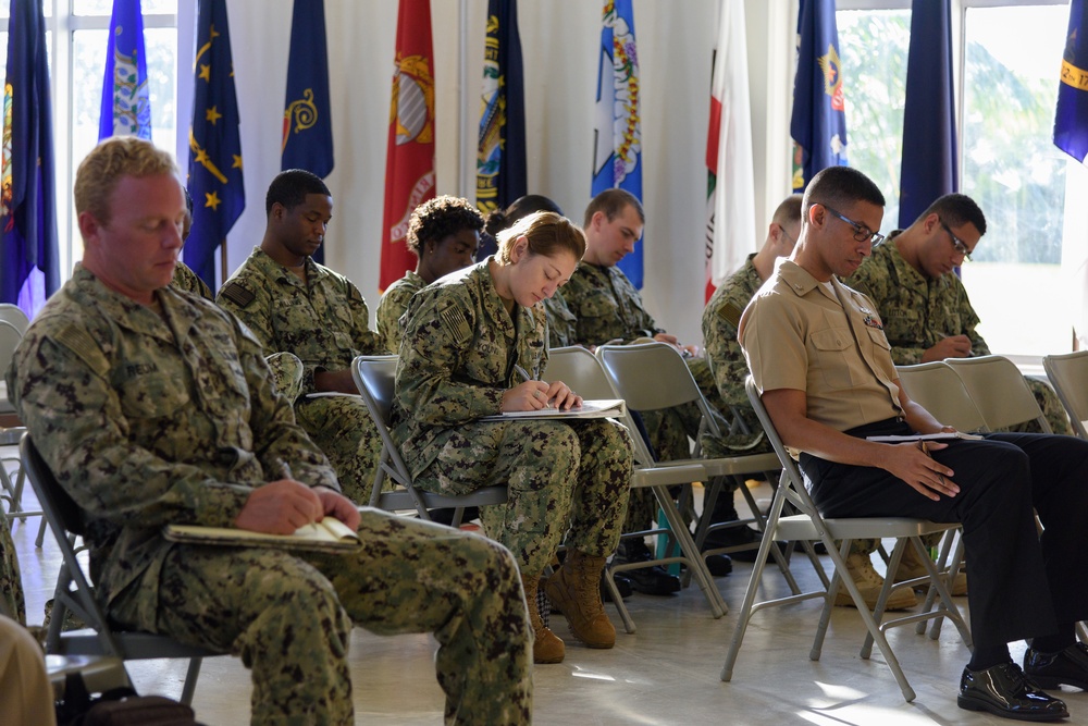 U.S. Naval Base Guam Command Master Chief Ken Ballard speaks at the Guam Yeoman-Legalman-Personnel Specialist Symposium