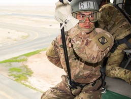 Service Members Participate in Helicopter Rappel and Sling Load Training