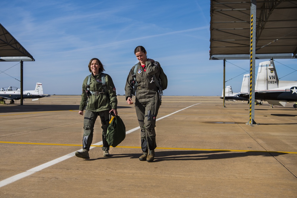 Chief Master Sergeant Juliet C. Gudgel and her pilot on the flightline