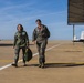 Chief Master Sergeant Juliet C. Gudgel and her pilot on the flightline