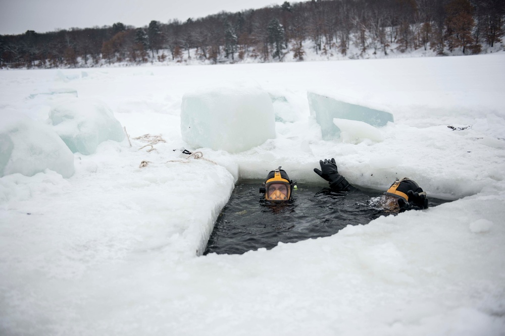 Divers Participate in Ice Diving Training