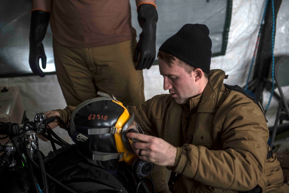 Divers Participate in Ice Diving Training