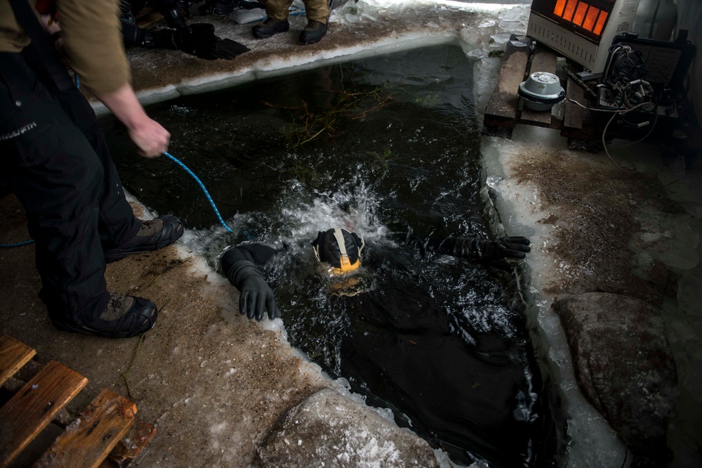 Divers Participate in Ice Diving Training