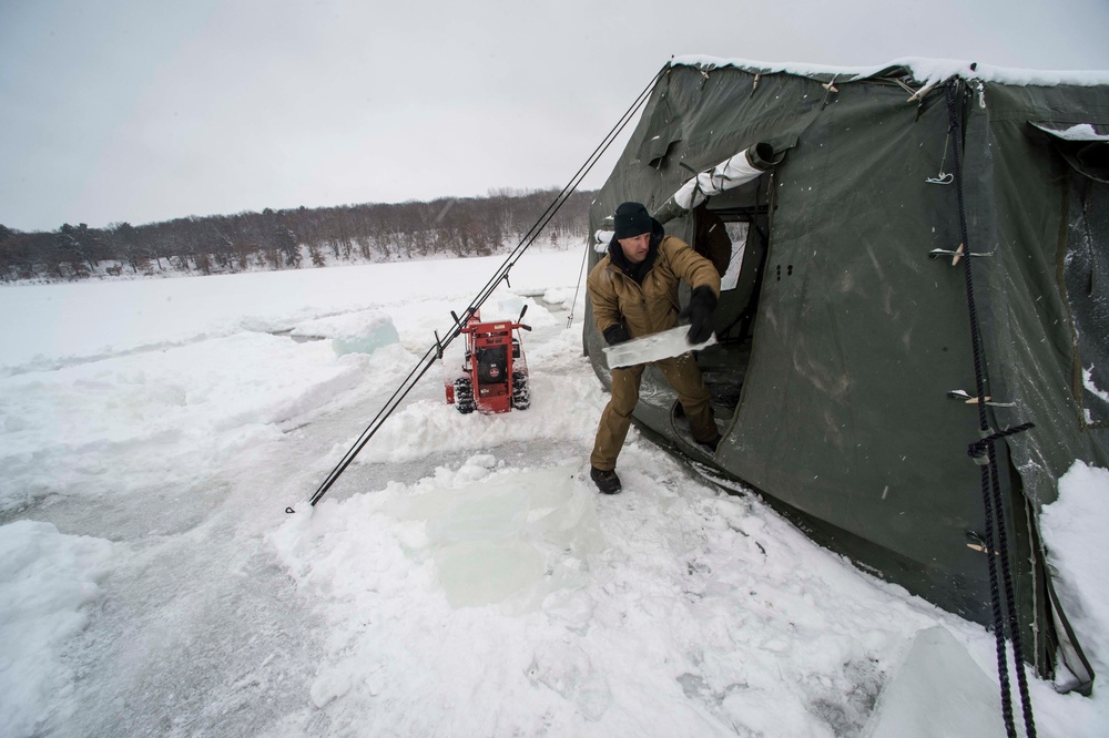 Divers Participate in Ice Diving Training