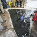 Divers Participate in Ice Diving Training