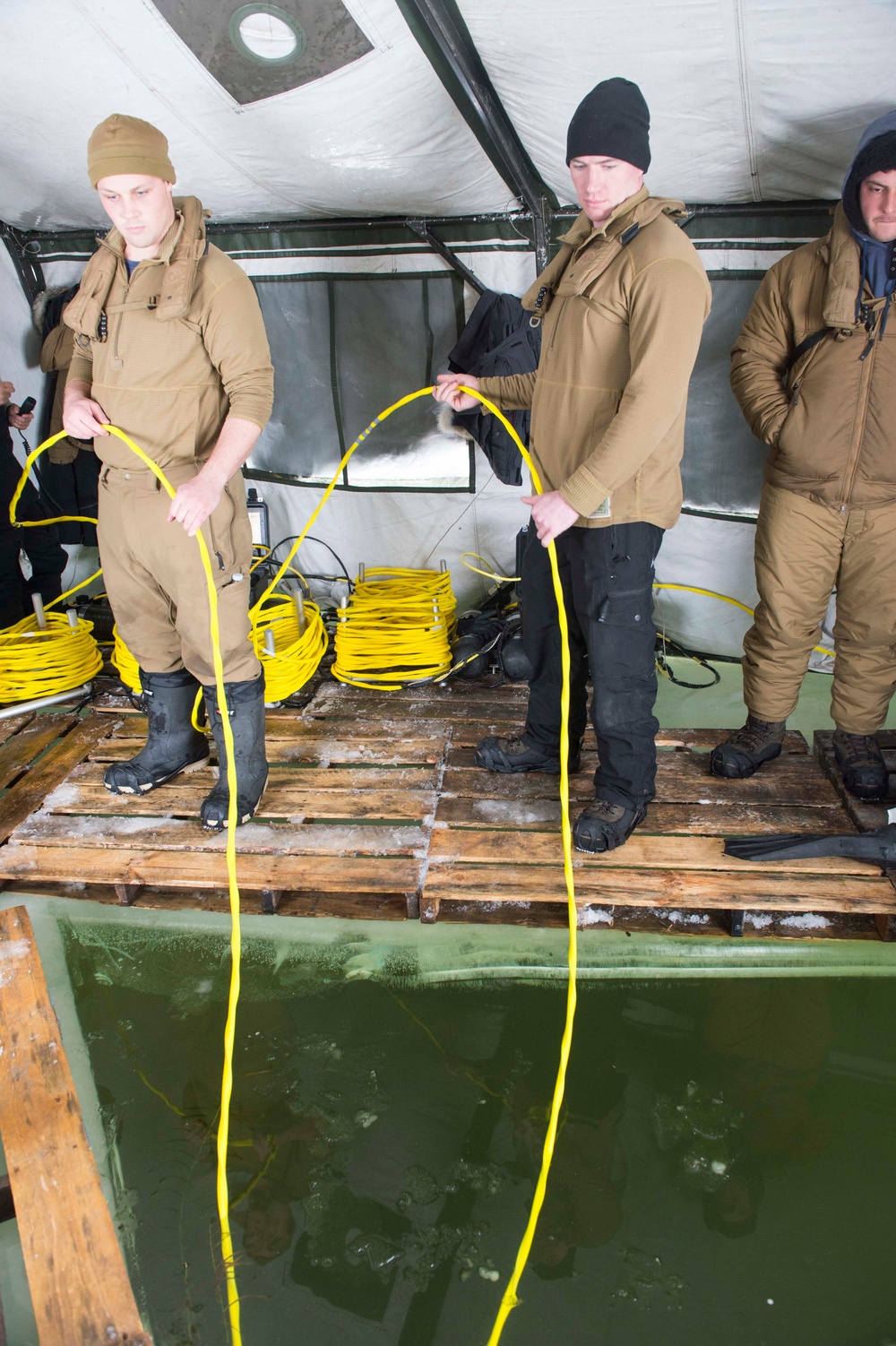 Divers Participate in Ice Diving Training