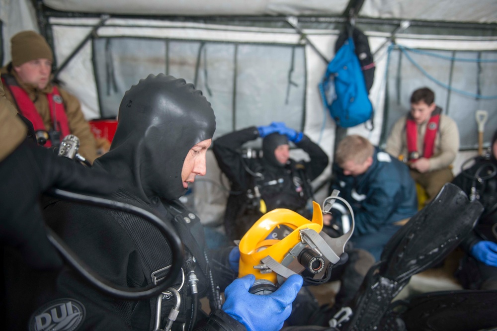 Divers Participate in Ice Diving Training