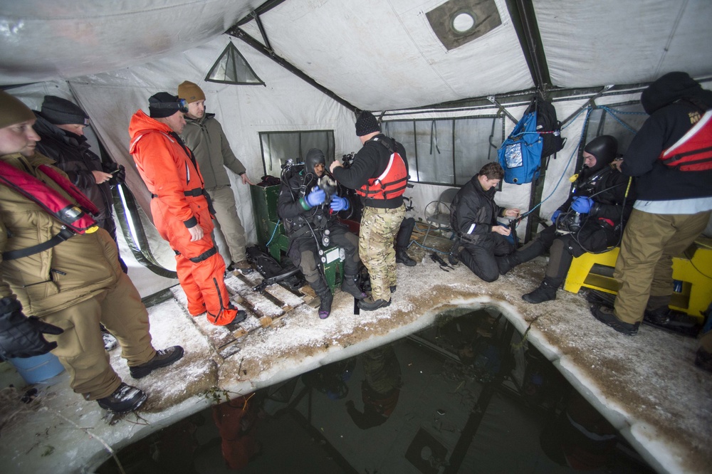 Divers Participate in Ice Diving Training