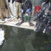 Divers Participate in Ice Diving Training