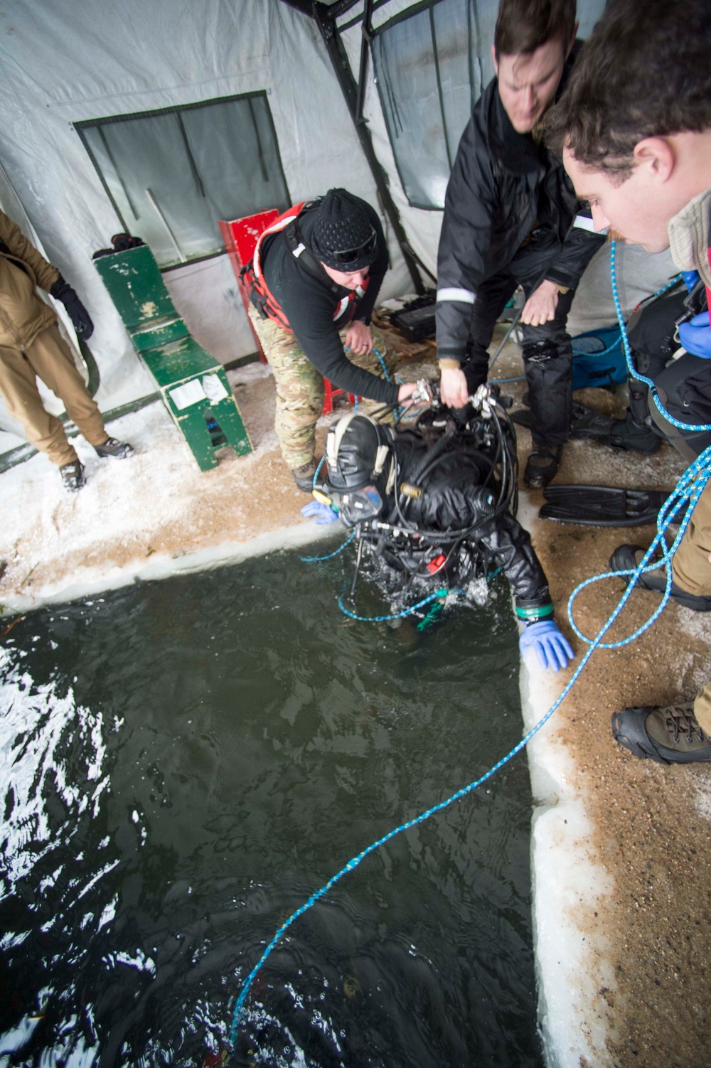 Divers Participate in Ice Diving Training