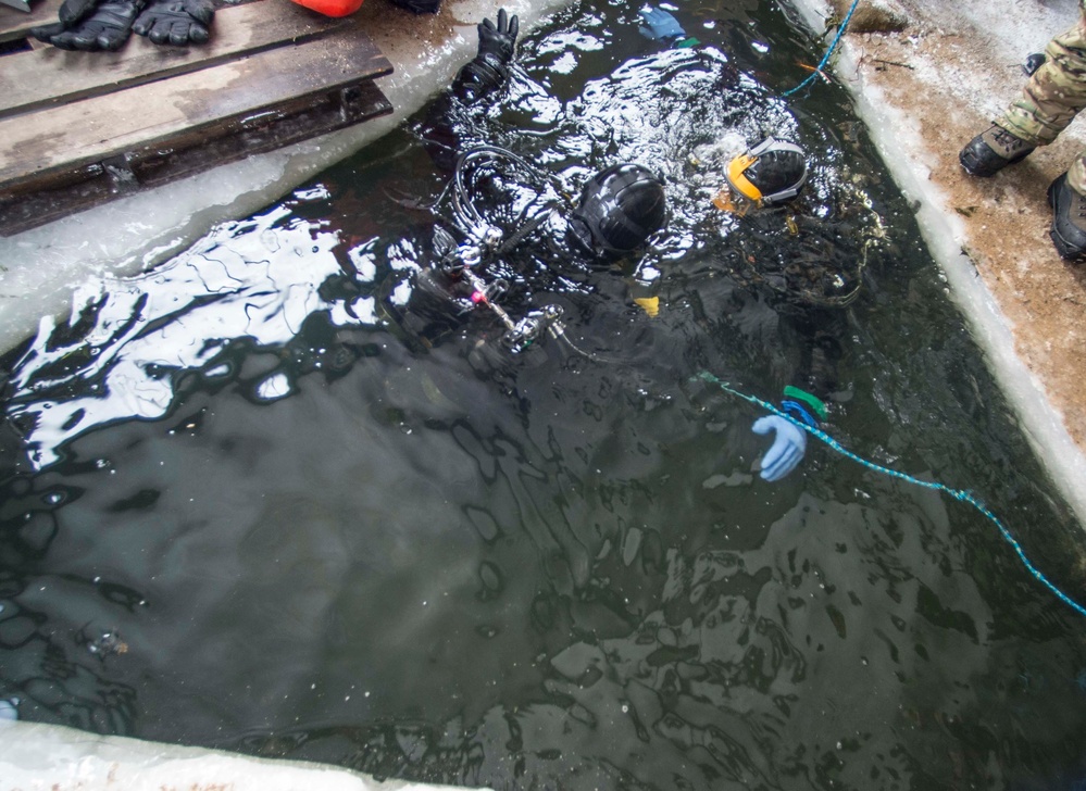 Divers Participate in Ice Diving Training