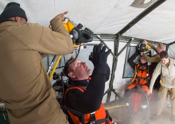 Divers Participate in Ice Diving Training