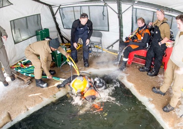 Divers Participate in Ice Diving Training
