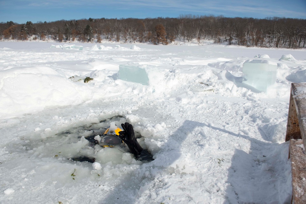 Divers Participate in Ice Diving Training