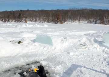 Divers Participate in Ice Diving Training