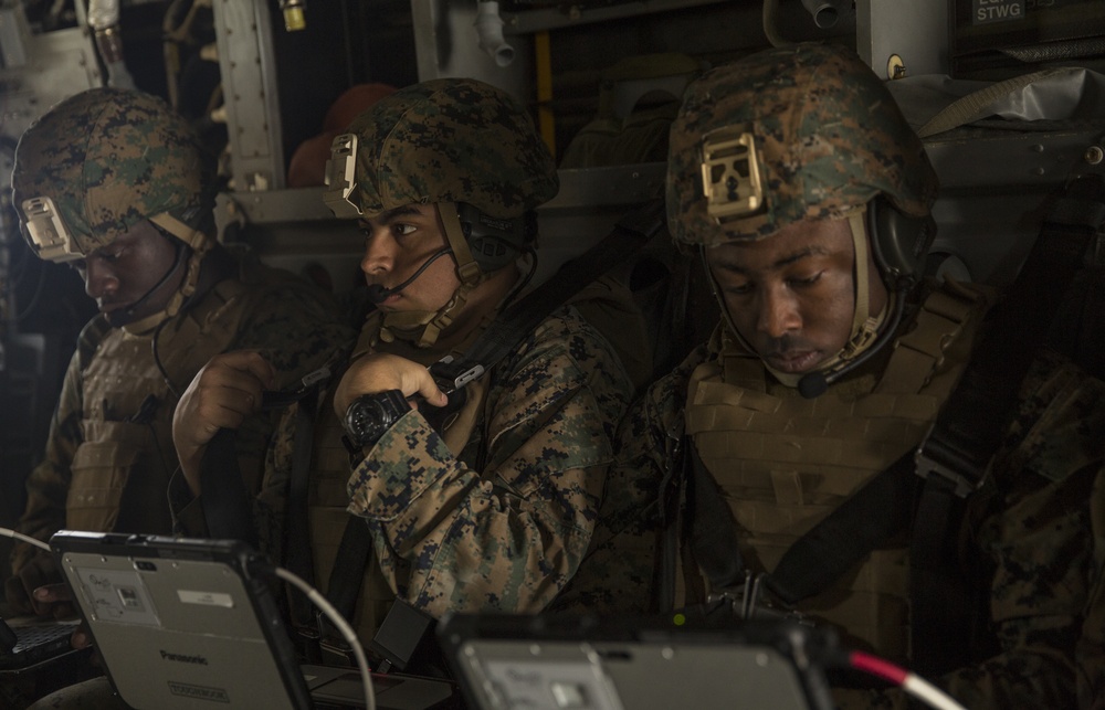 Marines participate in a Hatch Mounted Satellite Communication Antenna System training exercise