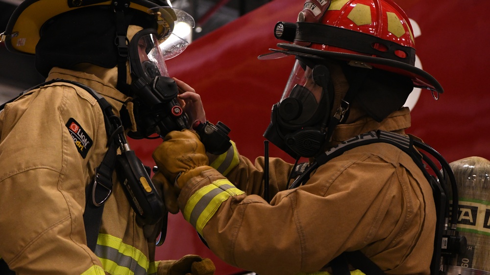 Firefighters conduct rapid intervention training